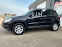 Volkswagen Tiguan 1.4 TSI Track&Field 4Motion 6 bak met elec. panoramadak en navigatie en parkeersensoren en trekhaak en bluetooth