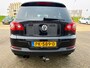 Volkswagen Tiguan 1.4 TSI Track&Field 4Motion 6 bak met elec. panoramadak en navigatie en parkeersensoren en trekhaak en bluetooth