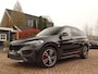 BMW X1 sDrive20i Sportif | All-Black | Uniek | Custom | 19 inch | Nav