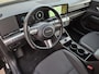Hyundai Kona 1.6 GDI HEV Comfort Smart / Fabrieksgarantie tot 1-2030 / Stuur- & Stoel verwarming / Achteruitrijcamera / Apple Carplay Android Auto / Keyless Entry/Start / Adaptief cruise control / Draadloze telefoon lader / Climate control /