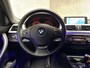 BMW 3-Serie 320i High Executive 184Pk Automaat (GROOT NAVI, CLIMATE, SFEERVERLICHTING, MEMORY SEATS, CRUISE, PARKEERSENSOREN, NIEUWSTAAT)
