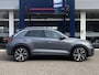 Volkswagen T-Roc 1.5 TSI R-Line Business+ / Automaat / Open-Panodak / Massage-Stoelen / Adaptieve Cruise-Control / Stoelverwarming / Matrix-LED / Sfeerverlichting / Apple-Carplay & Android-Auto / Draadloze-Telefoonlader / Climate-Control / Flippers / DAB Radio-Bluetooth / Navi / PDC V+A met Camera / 19'' LMV / ENZ.