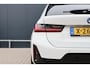 BMW 3-Serie Touring 320e | M Sport LCI | Leer / Alcantara | Trekhaak afn. | Live Cockpit Plus | DAB+ | Stoelverwarming | M-Pakket