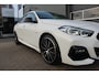 BMW 2-serie Gran Coupé 218i High Executive M-Sport | NL Auto | Panoramadak | Schaalstoelen | Camera | LED | Parking Pack | Sfeer | CarPlay | M Aerodynamicapakket | M sportonderstel | Sportstoelen | Navi | Cruise | LMV 19'' | Zeer nette