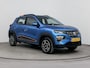 Dacia Spring COMFORT PLUS 27 kWh | LEDER | 14'' LM VELGEN | CAMERA | NAVI | PDC | AIRCO | APPLE CAR PLAY & ANDROID AUTO |