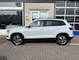 Skoda Karoq 1.5 TSI ACT Ambition / AUTOMAAT/ PANO/ KEYLESS/ ADAPTIVE CRUISE/ DIGITAL DASH/ DAB/ NAVI/ SMARTLINK/ CLIMA/ STUUR+ STOELVERWARMING V+A/ PARK. SENSOREN + CAMERA/ 17'' LMV