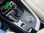 BMW X1 sDrive 2.0i 192pk autom ecc,beigeleer,lmv,navi,led,chroom,dglas,camera