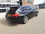 BMW 3-Serie Touring 320i Lease Executive Panorama Ned auto