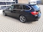 BMW 3-Serie Touring 320i Lease Executive Panorama Ned auto