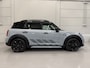 MINI Countryman 2.0 Cooper SE ALL4 Untamed PANO/H&K/HEAD-UP/CAMERA/18"BLACK/MEMORY/SFEER/UNION-FLAG A.LICHTEN/UNIEKE AUTO, ALLE EXTERIEUR ACCENTEN BLACK ALL BLACK INCL. BELTLINE EN VELGEN BLACK/MOMENTUM-GREY