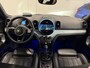 MINI Countryman 2.0 Cooper SE ALL4 Untamed PANO/H&K/SOH 92%/HEAD-UP/CAMERA/18"BLACK/MEMORY/SFEER/UNION-FLAG A.LICHTEN/UNIEKE AUTO, ALLE EXTERIEUR ACCENTEN BLACK ALL BLACK INCL. BELTLINE EN VELGEN BLACK/MOMENTUM-GREY