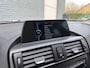 BMW 1-Serie 116i Upgrade Edition AUTOMAAT -LEDER-NAVI-STOELVERWARMING