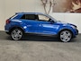 Volkswagen T-Roc 1.5 TSI SPORT AUTOMAAT NAVIGATIE ADAPTIVE CRUISE CONTROL APPLE CARPLAY/ANDROID RIJSTROOKSENSOREN ACHTERUITRIJCAMERA NIEUWE ALL SEASONS BANDEN AFN. TREKHAAK ZEER MOOI !! Brgl