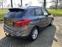 BMW 2-Serie Active Tourer 218i Centennial High Executive | AUTOMAAT | CLIMA | CRUISE | NAVI | PDC | SPORTSTOELEN | STOELVERW. | TREKHAAK