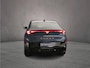 CUPRA Tavascan Business 286pk Automaat Warmtepomp, Adaptive cruise control, Achteruitrijcamera, Elektrische achterklep, LED koplampen, Navigatie, Stuurwiel verwarmd