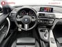 BMW 3-Serie 320i High Executive M-Sport 'AZURITSCHWARZ' 42.000 KM! Apple CarPlay | Schuif/Kanteldak | Leer | Sportstoelen