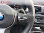 BMW 3-Serie 320i High Executive M-Sport 'AZURITSCHWARZ' 42.000 KM! Apple CarPlay | Schuif/Kanteldak | Leer | Sportstoelen