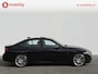 BMW 3-Serie 320i High Executive M-Sport 'AZURITSCHWARZ' 42.000 KM! Apple CarPlay | Schuif/Kanteldak | Leer | Sportstoelen