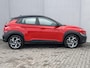 Hyundai Kona 1.6 GDI HEV Fashion Automaat / Fabrieksgarantie tot 10-2027 / Dealer Onderhouden / Adaptieve Cruise / Stuur & Stoelverwarming / Camera / Navigatie / Dodehoek Detectie / Apple Carplay & Android Auto / 18” LM wielen Premium / DAB /