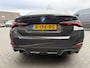 BMW i4 eDrive40 84 kWh | M-Pakket | Schuifdak | Dravitgrau metallic | NL-Auto |