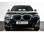 BMW iX3 Executive 80 kWh Driving Assistant Professional - Comfort Access - Elektrisch verwarmde voorstoelen - Sportstoelen - Parking Pack - Automatisch dimmende binnenspiegel - Adaptief onderstel -