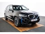 BMW iX3 Executive 80 kWh Driving Assistant Professional - Comfort Access - Elektrisch verwarmde voorstoelen - Sportstoelen - Parking Pack - Automatisch dimmende binnenspiegel - Adaptief onderstel -