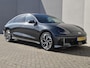 Hyundai Ioniq 6 Lounge AWD 77.4 kWh 325pk Automaat / Accu SOH 100% / Fabrieksgarantie tot 03-2029 / Trekgewicht 1.500 kg / warmtepomp / CCS snellader / Rondomzicht camera / Head Up Display / Bose Audio Systeem / Stuur- en Stoelverwarming / Elektrische achterklep / Adaptief cruise control /