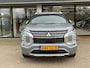 Mitsubishi Outlander 2.4 PHEV Instyle DEMO ( beschikbaar per 09-2026 ) | Lederen bekleding | Elektrisch verstelbare voorstoelen | Verwarmbare stoelen voor- en achter | Elektrisch panoramadak | 3-zone Climate Control | 8 jaar fabrieksgarantie