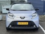 Toyota Aygo X 1.0 VVT-i MT JBL | Apple Carplay/Android Auto | Stoelverwarming | Parkeercamera/-sensoren | Climate Control | Draadloze telefoonlader | Keyless Entry/Start | Adaptive Cruise Control | DAB | Weinig kilometers!! |