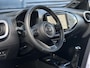 Toyota Aygo X 1.0 VVT-i MT JBL | Apple Carplay/Android Auto | Stoelverwarming | Parkeercamera/-sensoren | Climate Control | Draadloze telefoonlader | Keyless Entry/Start | Adaptive Cruise Control | DAB | Weinig kilometers!! |