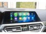 BMW 3-Serie Touring 320i High Executive TREKHAAK | PANO | KUIPSTOELEN | CARBON | ADAPTIVE | MEMORY | LASER
