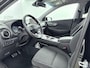 Hyundai Kona Electric EV FASHION 64 kWh | DODEHOEK DETECTIE | PDC | 3 FASEN | WARMTEPOMP | CAMERA | CLIMA | CRUISE ADAPT. | NAVI | STOELVERWARMING | STUURVERWARMING | PRIVACY GLASS |