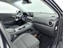 Hyundai Kona Electric EV FASHION 64 kWh | DODEHOEK DETECTIE | PDC | 3 FASEN | WARMTEPOMP | CAMERA | CLIMA | CRUISE ADAPT. | NAVI | STOELVERWARMING | STUURVERWARMING | PRIVACY GLASS |