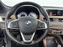 BMW X1 sDrive20i ORANGE EDITION II | SCHUIFDAK | LEDER | CLIMA | CRUISE | NAVI | 18'' LM VELGEN | ELEKTRISCHE ACHTERKLEP | VERWARMDE VOORSTOELEN |