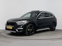 BMW X1 sDrive20i ORANGE EDITION II | SCHUIFDAK | LEDER | CLIMA | CRUISE | NAVI | 18'' LM VELGEN | ELEKTRISCHE ACHTERKLEP | VERWARMDE VOORSTOELEN |
