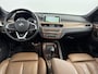 BMW X1 sDrive20i ORANGE EDITION II | SCHUIFDAK | LEDER | CLIMA | CRUISE | NAVI | 18'' LM VELGEN | ELEKTRISCHE ACHTERKLEP | VERWARMDE VOORSTOELEN |