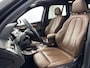 BMW X1 sDrive20i ORANGE EDITION II | SCHUIFDAK | LEDER | CLIMA | CRUISE | NAVI | 18'' LM VELGEN | ELEKTRISCHE ACHTERKLEP | VERWARMDE VOORSTOELEN |