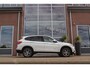 BMW X1 sDrive18i Centennial High Executive X-line | 2e eigenaar | Sportstuur | Cruise control | Stoelverwarming | Bluetooth | Navigatie | PDC | Climate control