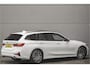 BMW 3-Serie Touring 330i High Executive Pano HUD ACC Trekhaak Stoel & Stuurverw