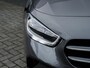 Mercedes-Benz B-klasse 180 Business Solution | Origineel NL | 2e Eigenaar | Navigatie | Camera | Climate Control | Cruise Control | Wide Screen | All Season Banden | 16'' Lichtmetalen Velgen | Metallic Lak | Dimlichten Automatisch |