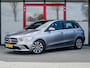 Mercedes-Benz B-klasse 180 Business Solution | Origineel NL | 2e Eigenaar | Navigatie | Camera | Climate Control | Cruise Control | Wide Screen | All Season Banden | 16'' Lichtmetalen Velgen | Metallic Lak | Dimlichten Automatisch |