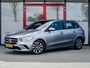Mercedes-Benz B-klasse 180 Business Solution | Origineel NL | 2e Eigenaar | Navigatie | Camera | Climate Control | Cruise Control | Wide Screen | All Season Banden | 16'' Lichtmetalen Velgen | Metallic Lak | Dimlichten Automatisch |