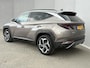 Hyundai Tucson 1.6 T-GDI HEV Premium Sky / NL auto / Schuif/open dak / Stoel-/stuurverwarming / Navigatie / Achteruitrij-/360 Camera / Apple Carplay/Android auto / Elektrische achterklep / KRELL audio / Leren Bekleding /