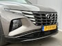 Hyundai Tucson 1.6 T-GDI HEV Premium Sky / NL auto / Schuif/open dak / Stoel-/stuurverwarming / Navigatie / Achteruitrij-/360 Camera / Apple Carplay/Android auto / Elektrische achterklep / KRELL audio / Leren Bekleding /