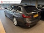 BMW 3-Serie Touring 320e Business Edition Plus,leer,navi,trekhaak,orig ned ,dealer onderhouden