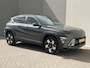 Hyundai Kona 1.6 GDI HEV Comfort Smart Automaat / Fabrieksgarantie tot 1-2030 / Stuur- & Stoel verwarming / Achteruitrijcamera / Apple Carplay Android Auto / Keyless Entry/Start / Adaptief cruise control / Draadloze telefoon lader / Climate control /