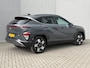 Hyundai Kona 1.6 GDI HEV Comfort Smart Automaat / Fabrieksgarantie tot 1-2030 / Stuur- & Stoel verwarming / Achteruitrijcamera / Apple Carplay Android Auto / Keyless Entry/Start / Adaptief cruise control / Draadloze telefoon lader / Climate control /