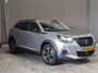 Peugeot 2008 1.2 PureTech Allure Pack Airco | AppleCarplay/ Android Auto | Camera | Cruise Control | DAB | LED | LMV 17" | PDC Achter |