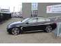 BMW 4-Serie Gran Coupe 420i High Executive M-pakket/Panoramadak/Stoelverwarming/Head-Up display/Harman kardon/DAB/Lederen bekleding/Achteruitrijcamera/19 Inch