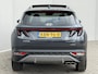 Hyundai Tucson 1.6 T-GDI HEV Premium Sky / Panoramadak / 1650kg Trekgewicht / Fabrieksgarantie tot 3-2028 / Dealer Onderhouden / Stoel Verwarming / Stoel Ventilatie / Stuurwiel Verwarming / Elektr. Verstelbare Stoelen + Memory / Dodehoek Detectie / Camera / Navigatie / Adaptieve Cruise / Elektr. Achterklep / Krell / DAB /
